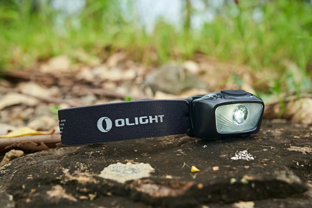 Olight H05S 200lm 60m Headlamp Senter Kepala LED Rechargeable Olight H05S New is a compact and lightweight headlamp with 5 light settings and gesture control. It delivers a max output of 200 lumens and a 60-meter beam distance–more than enough for everyday tasks. The large top button makes it super easy to switch between 3 white light and 2 red light settings. In sensor mode, you can simply wave your hand to turn on/off the headlamp. It can be tilted down up to 45 degrees to enable any requirements for the viewing angle that you may have. At only 2.30×1.44×1.33in and 2.38oz, you won’t even notice that you’re wearing this tiny and lightweight headlamp. The nylon elastic strap makes it comfortable and safe to wear and it can be easily adjusted to different head sizes. The built-in low battery indicator reminds you to replace the batteries. The headlamp brings you hands-free and no-touch convenience during working, repairing, jogging, climbing, camping, and so much more.