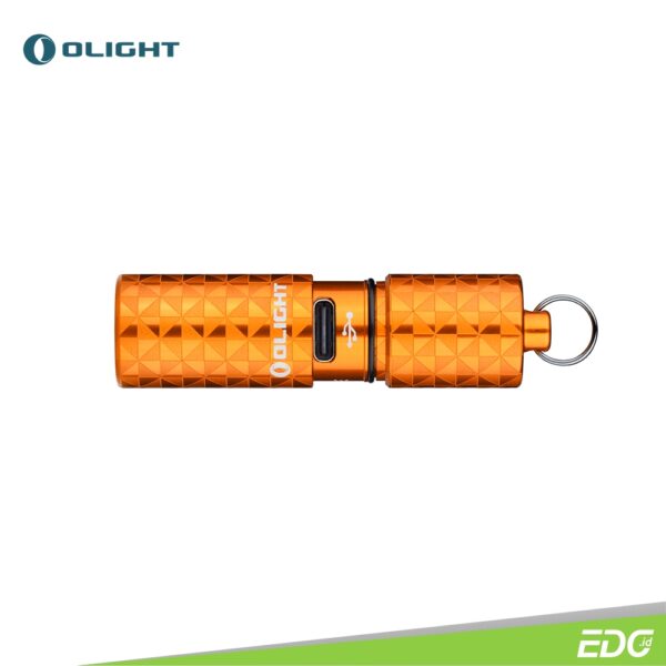 Olight i1R 2 Pro Pinwheel Orange 180lm Rechargeable Senter Mini Flashlight LED Olight i1R 2 Pro is the upgraded version of i1R 2 EOS, Olight’s popular rechargeable keychain flashlight. The high-performance CSP (chip scale package) LED, paired with a TIR optic lens, generates a soft, well-balanced beam of 5 lumens or 180 lumens. Users can turn the light on/off and switch outputs with a simple twist of the head. Powered by a larger built-in 130mAh Lithium-ion battery, it runs up to 12 hours. The flashlight adopts the new USB-C port instead of the old Micro-USB port, which makes charging easier. The aluminum alloy body makes this small light extremely durable. Only 51.3mm/2.02in long with a weight of only 22g/0.78oz, it is the perfect addition to your keychain.