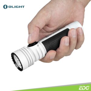 Olight Seeker 4 Pro White 4600lm 260m Rechargeable Flashlight Senter LED Olight Seeker 4 Pro cool white (5700K~7000K) features an incredible max output of 4,600 lumens and a 260-meter beam distance. This is a 400-lumen increase from the previous Seeker 3 Pro by implementing higher circuit efficiency, without compromising the runtime with its included 5,000mAh 21700 battery. The enlarged metal side switch offers improved rotational grip and a much smoother stepless dimming experience, allowing for easier operation even while wearing heavy gloves. The flashlight incorporates Laser Microperforation technology for the first time in the flashlight industry, creating small holes with a laser and resulting in a distinctive translucent dashboard display on metal. More importantly, this upgraded version comes with an industry-leading innovative holster that offers flashlight auto lock/unlock, charging, storage, and carrying options. When the flashlight is in the holster, it intelligently lowers the brightness to below 600 lumens, ensuring user safety.